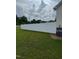 Spacious fenced-in yard with mature landscaping at 3901 La Varra Dr, Clayton, NC 27520