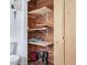 Efficiently designed closet with custom shelving and a cedar-lined interior for optimal storage at 497 Turn Key Way, Pittsboro, NC 27312