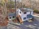 Overhead shot of house with shed, deck and staircase, perfect for outdoor enjoyment and relaxation at 497 Turn Key Way, Pittsboro, NC 27312