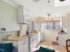 Bright kitchen with white cabinets, butcher block countertops, and natural light at 497 Turn Key Way, Pittsboro, NC 27312