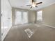 Bedroom with double doors leading to a balcony at 5023 Lalex Ln, Cary, NC 27519