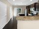 Kitchen with granite countertops and access to backyard at 5023 Lalex Ln, Cary, NC 27519