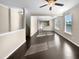Spacious living room with dark hardwood floors and lots of natural light at 5023 Lalex Ln, Cary, NC 27519