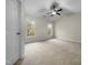 Spacious bedroom with ceiling fan and large windows at 520 Matheson Pl, Cary, NC 27511