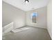 Bedroom with large window and neutral decor at 520 Matheson Pl, Cary, NC 27511