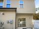 Rear exterior view showcasing sliding glass doors at 520 Matheson Pl, Cary, NC 27511