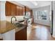 Kitchen with granite countertops and hardwood floors at 520 Matheson Pl, Cary, NC 27511
