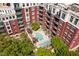 Luxury condo building with courtyard pool and lush landscaping at 618 N Boylan Ave # 1028, Raleigh, NC 27603