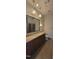 Double vanity bathroom with large mirror and tile flooring at 618 N Boylan Ave # 1028, Raleigh, NC 27603