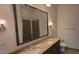 Modern bathroom with double vanity, large mirror, and shower at 618 N Boylan Ave # 1028, Raleigh, NC 27603