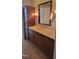 Bathroom with single vanity and large mirror at 618 N Boylan Ave # 1028, Raleigh, NC 27603