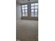 Bright bedroom with carpet and large windows at 618 N Boylan Ave # 1028, Raleigh, NC 27603