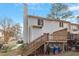 Elevated deck with stairs, overlooking the backyard at 6539 English Oaks Dr, Raleigh, NC 27615