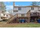 Townhome backyard with wooden deck and fenced yard at 6539 English Oaks Dr, Raleigh, NC 27615