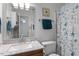 Clean bathroom with granite vanity, and seashell shower curtain at 6539 English Oaks Dr, Raleigh, NC 27615