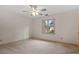 Spacious bedroom with ceiling fan and carpeting at 6539 English Oaks Dr, Raleigh, NC 27615