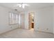 Bedroom with ceiling fan and access to bathroom at 6539 English Oaks Dr, Raleigh, NC 27615