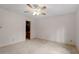 Bright bedroom with ceiling fan and access to bathroom at 6539 English Oaks Dr, Raleigh, NC 27615