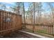 Deck with wooden privacy fence and wooded views at 6539 English Oaks Dr, Raleigh, NC 27615