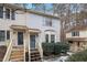 Front view of a townhome with gray siding and a wooden deck at 6539 English Oaks Dr, Raleigh, NC 27615