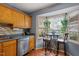 Bright kitchen nook with built-in seating and bay window at 6539 English Oaks Dr, Raleigh, NC 27615