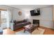 Comfortable living room featuring a fireplace and access to deck at 6539 English Oaks Dr, Raleigh, NC 27615