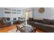 Spacious living room with hardwood floors and fireplace at 6539 English Oaks Dr, Raleigh, NC 27615