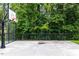 Outdoor basketball court with a concrete surface at 661 Morning Glade St, Wake Forest, NC 27587