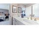 Modern bathroom with double vanity and updated fixtures at 661 Morning Glade St, Wake Forest, NC 27587