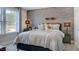 Spacious bedroom with a large window and stylish decor at 661 Morning Glade St, Wake Forest, NC 27587
