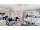 Open concept living area featuring hardwood floors and kitchen views at 661 Morning Glade St, Wake Forest, NC 27587
