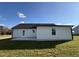 House exterior showcasing a patio and well-maintained lawn at 75 Shiloh Dr, Lillington, NC 27546