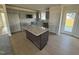 Modern kitchen with grey cabinets and granite countertops at 75 Shiloh Dr, Lillington, NC 27546