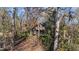Aerial view of log cabin in the woods at 90 Little Indian Creek Rd, Goldston, NC 27252