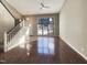 Two story living room with hardwood floors and staircase at 106 W Laurenbrook Ct, Cary, NC 27518