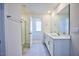 Double vanity bathroom with a large mirror and shower at 1108 Middlecrest Dr, Rocky Mount, NC 27804