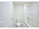 Clean bathroom featuring a shower/tub combo and updated toilet at 1108 Middlecrest Dr, Rocky Mount, NC 27804
