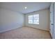 Spacious bedroom with a large window and neutral wall colors at 1108 Middlecrest Dr, Rocky Mount, NC 27804