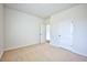 Bright bedroom with neutral carpeting and an adjacent door at 1108 Middlecrest Dr, Rocky Mount, NC 27804