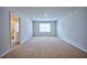 Large bedroom with carpet and access to a bathroom at 1108 Middlecrest Dr, Rocky Mount, NC 27804