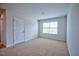 Bright bedroom with neutral walls and carpeted floor at 1108 Middlecrest Dr, Rocky Mount, NC 27804