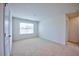 Bright bedroom with neutral walls and carpeted floor at 1108 Middlecrest Dr, Rocky Mount, NC 27804