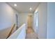 Upper level hallway with access to bedrooms and bathroom at 1108 Middlecrest Dr, Rocky Mount, NC 27804