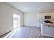 Kitchen with white cabinets, granite counters, and access to a patio at 1108 Middlecrest Dr, Rocky Mount, NC 27804