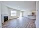 Spacious living room with hardwood floors and a cozy fireplace at 1108 Middlecrest Dr, Rocky Mount, NC 27804