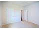 Bedroom with neutral walls, carpet flooring, and access to another room at 1117 Middlecrest Dr, Rocky Mount, NC 27804