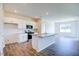 Modern kitchen with white cabinets, granite counters, and stainless steel appliances at 1117 Middlecrest Dr, Rocky Mount, NC 27804