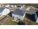 Two-story house with backyard, patio, and trampoline at 1134 Aster Way, Burlington, NC 27215