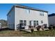 Backyard with patio, fire pit, and seating area at 1134 Aster Way, Burlington, NC 27215