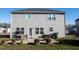 Spacious backyard with patio, fire pit, and seating area at 1134 Aster Way, Burlington, NC 27215